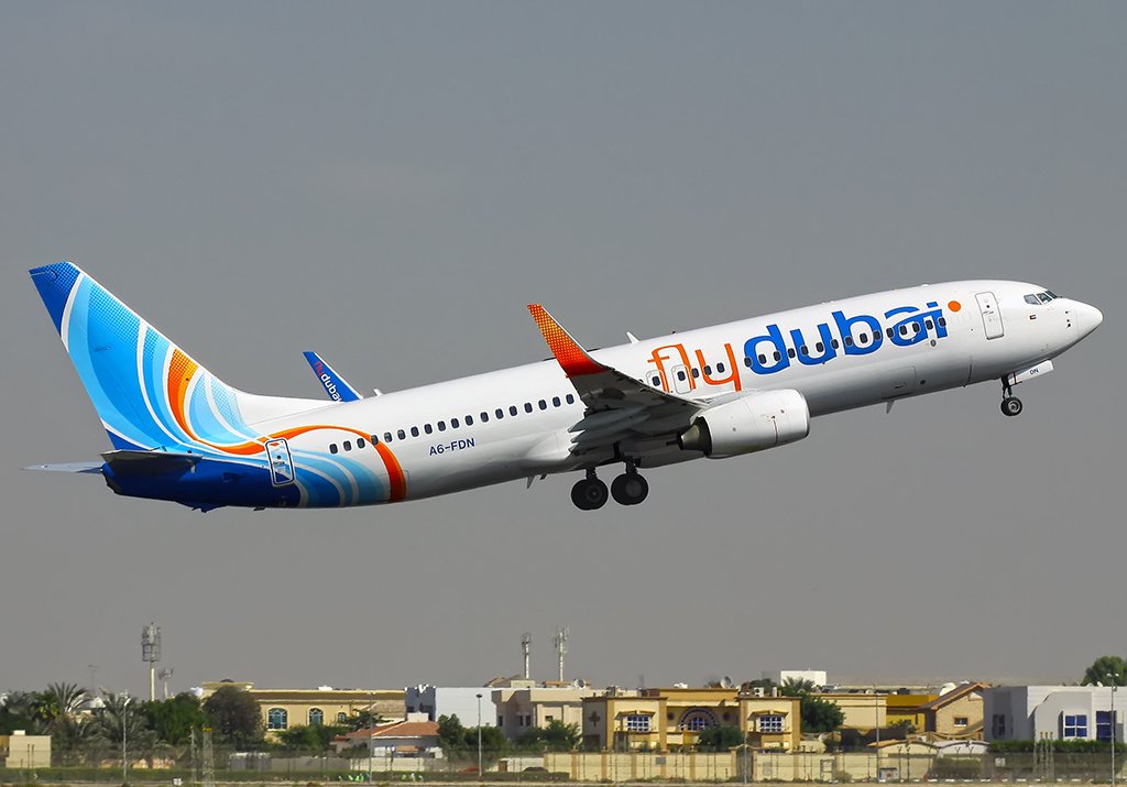 A flydubai Boeing 737-800 aircraft in flight, the type serving the new daily Dubai-Pokhara route
